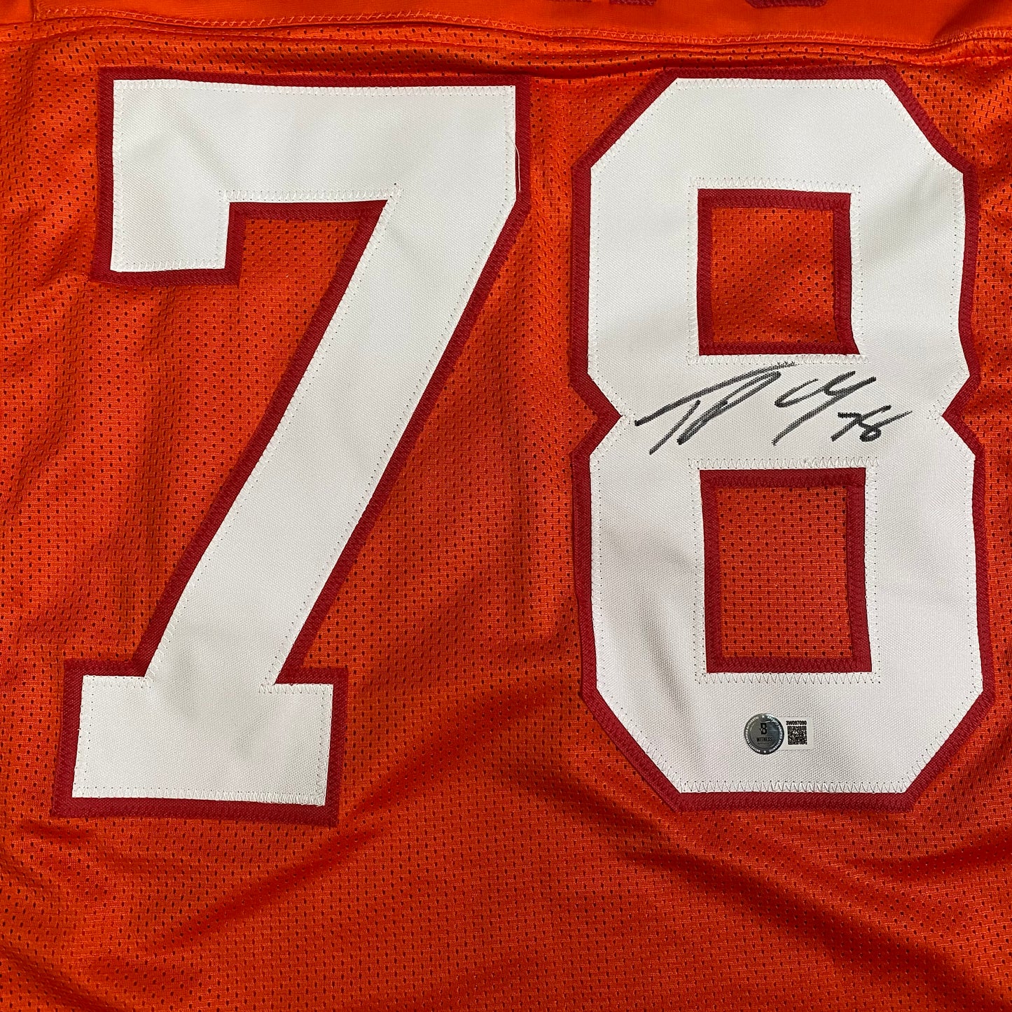 Tristan Wirfs signed orange #78 stitched jersey